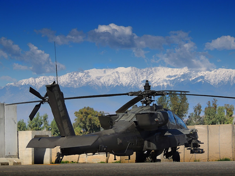 Illustration for article titled One Of Our Readers Is Flying Apaches In Afghanistan And Really Knows How To Use A Camera